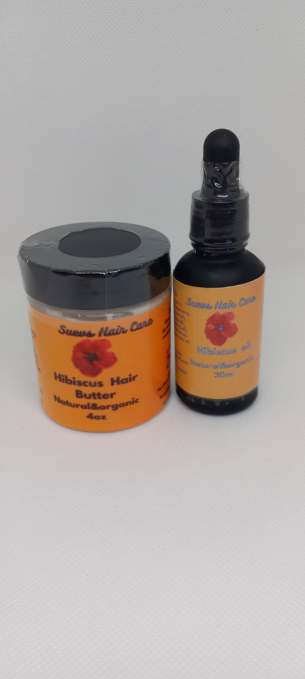Hibiscus Hair Care Set with 30ml hair oil and 4oz Hibiscus Butter to nourish, moisturize, and support healthy hair growth.