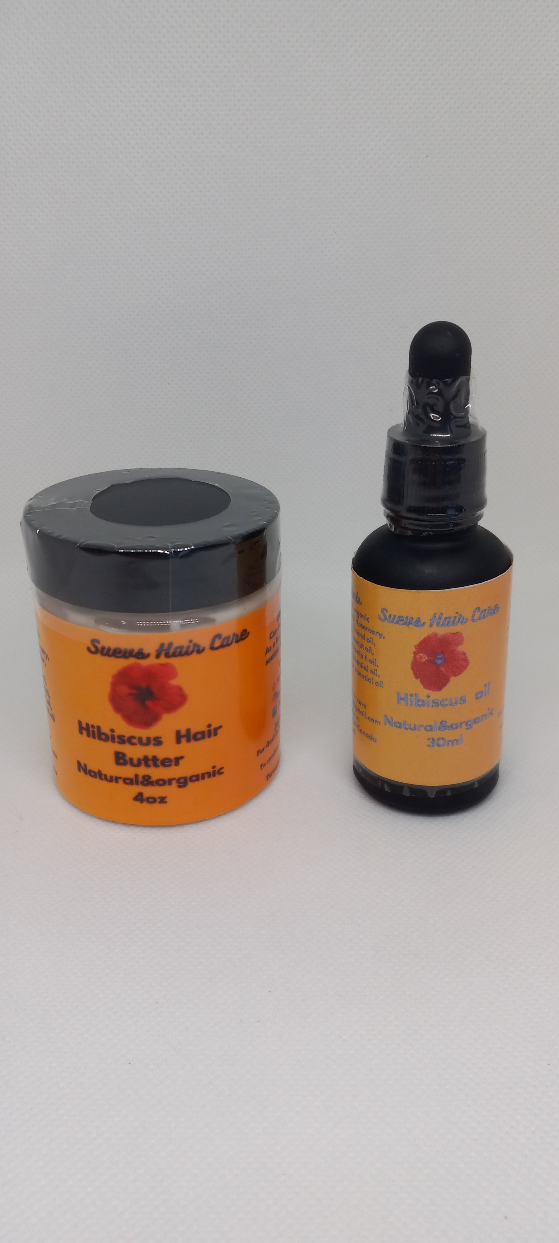 30ml Hibiscus oil and 4oz Hibiscus Butter made with shea butter, mango butter, hibiscus petals, and essential oils for scalp care and moisture retention.